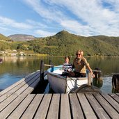 RS kalterersee herbst personen boot