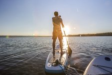 Adobe Stock stand up paddling