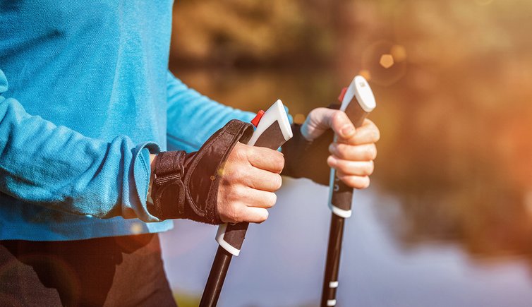 Adobe Stock nordic walking wander stoecke person